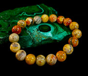 Reiki-Infused Crazy Lace Agate Strength & Stability Bracelet – 10mm Beads (Medium Wrist)