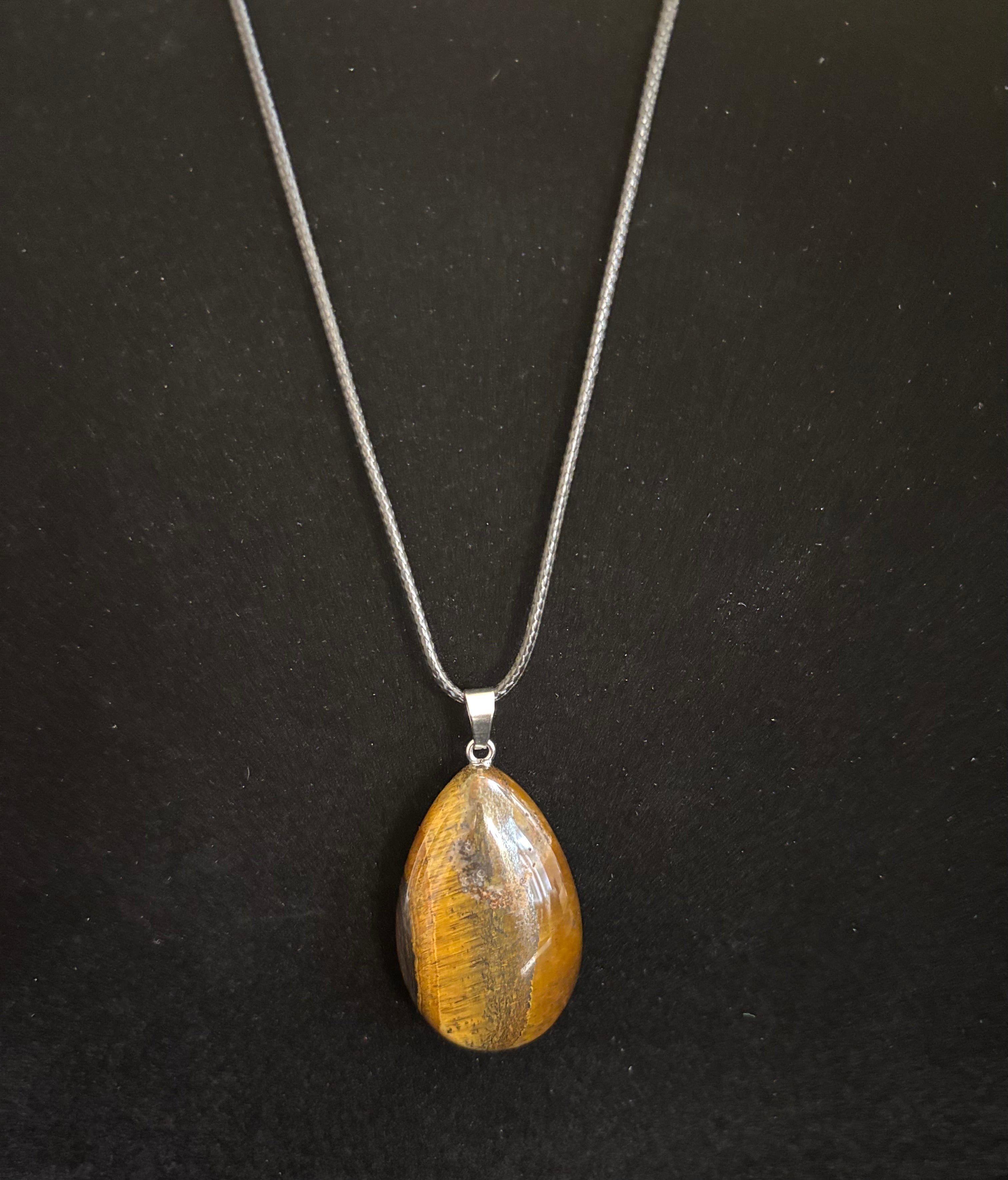 Grounded Elegance: Natural Tiger Eye Leather Pendant Necklace on Leather Rope
