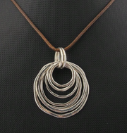 🔘 7-Layered Asymmetrical Circle Pendant Necklace – Bold. Minimal. Fabulous.