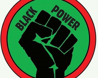 Black power fist 1" Round 